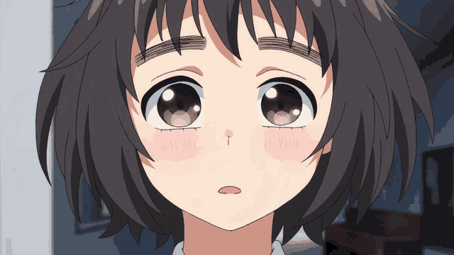 a close up of a girl 's face with a red spot on it
