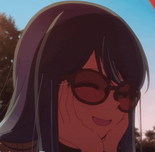 a close up of a girl wearing glasses with her mouth open