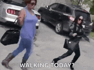 two women are walking down a street with a car in the background and the words `` walking today ? ''