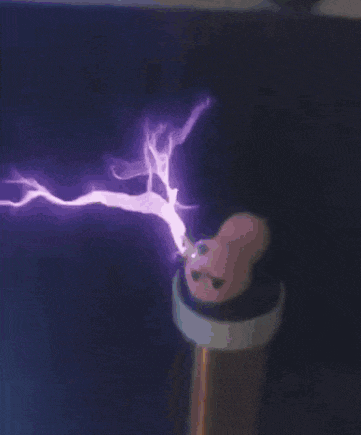 a close up of a purple lightning bolt with a skull in the background