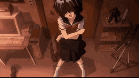 a girl in a school uniform is standing with her arms crossed in a room
