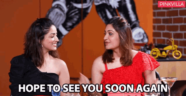 two women are sitting next to each other and the words hope to see you soon again are on the screen