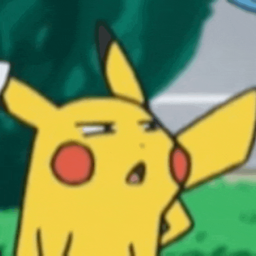a close up of a pikachu cartoon character with a surprised look on his face .