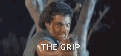 a close up of a person 's back with the words `` the grip '' written in the background .