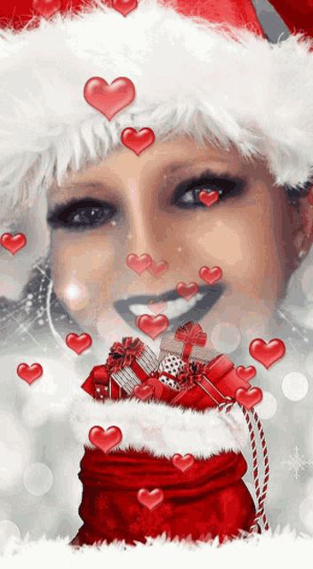 a woman wearing a santa hat and holding a bag of gifts