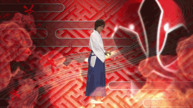 a man in a kimono stands in front of a red and orange background