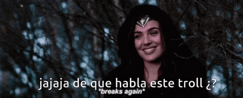 a woman with a crown on her head is smiling with the words " jaaja de que habla este troll " above her