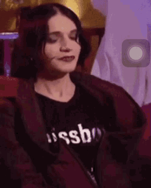 a woman wearing a t-shirt that says ' ssb ' on it