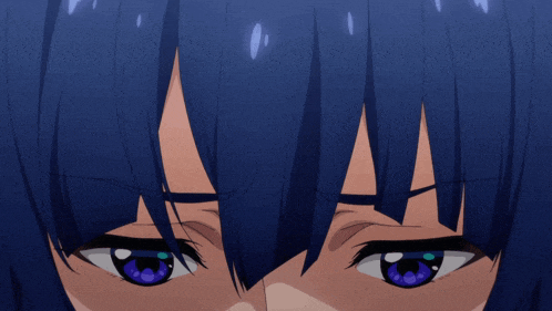 a close up of a girl with blue eyes