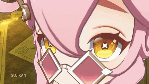 a close up of a girl 's eyes with the word sujikan written on the bottom
