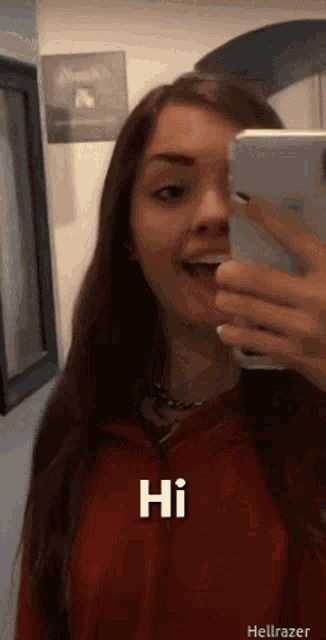 a girl is taking a selfie with her phone and the words hi are on the bottom