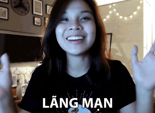 a woman wearing a shirt that says lang man