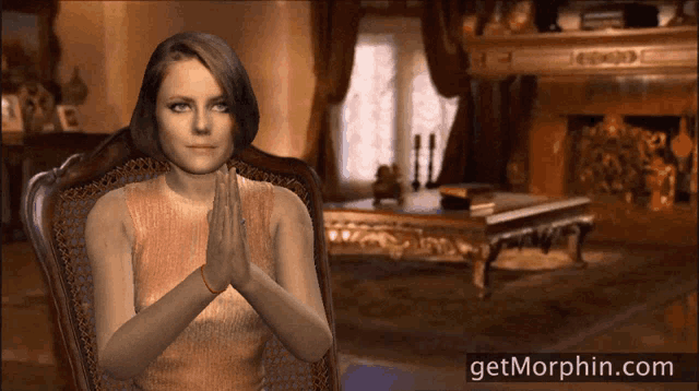 a woman sits in a chair with her hands folded in front of a fireplace with the website getmorphin.com below her