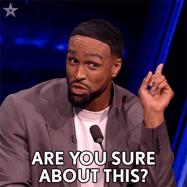 a man speaking into a microphone with the words " are you sure about this "
