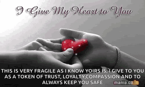 a person is holding a red heart in their hands with a quote .