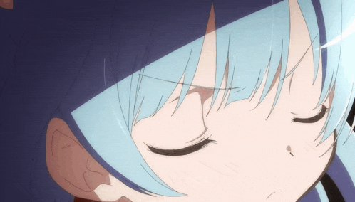 a close up of a girl with blue hair