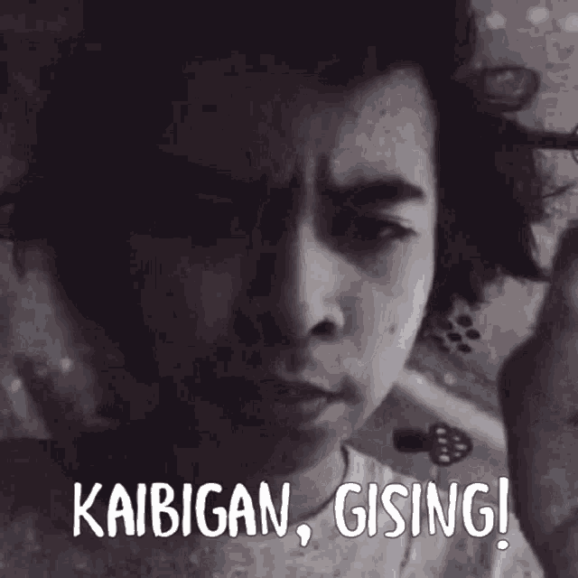 a black background with the words kaibigan gising written in white