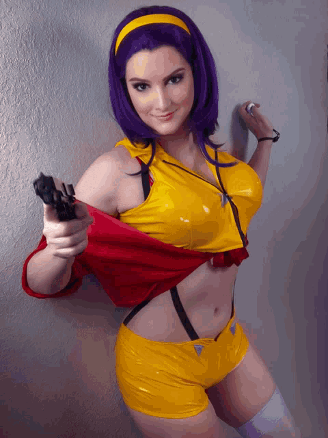 a woman with purple hair is holding a gun in her hand