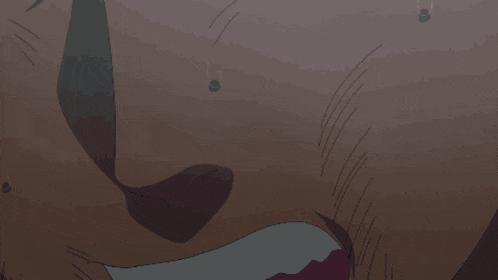 a close up of a person 's face with a pink tongue