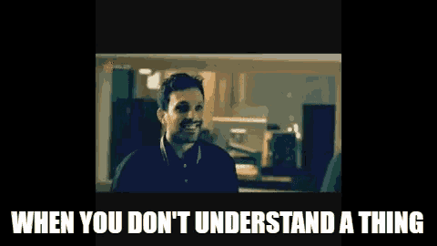 a man is smiling with the words " when you don 't understand a thing " behind him