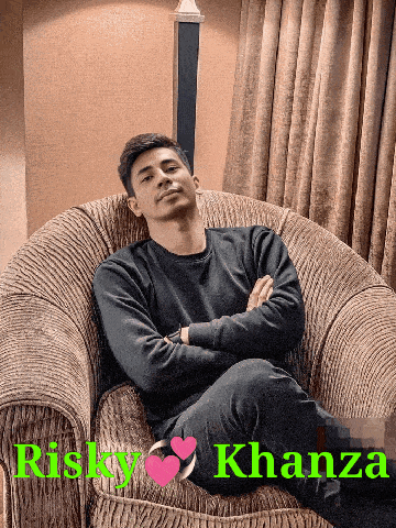 a man is sitting in a chair with the words risky khanza written on the bottom