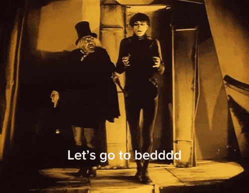 a man in a top hat says let 's go to bedddd while walking with another man
