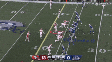 a football game is being played between the seahawks and the 49ers