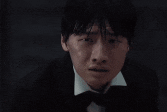 a group of men in tuxedos and bow ties are standing in front of a black wall with the time 04:24 on it
