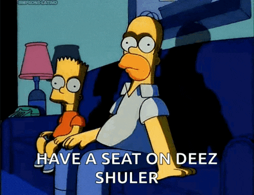 a cartoon of homer simpson and bart simpson sitting on a couch saying have a seat