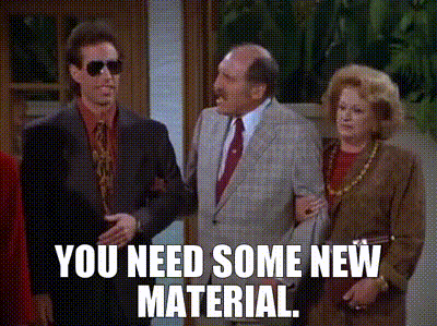 a group of people standing next to each other with the words `` you need some new material '' on the bottom .