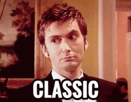 a man in a tuxedo is making a face and the word classic is on his face .