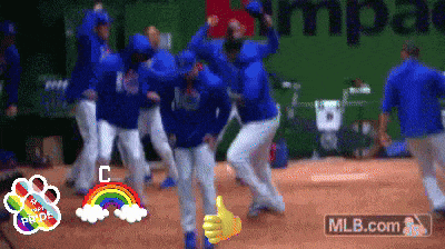 a group of baseball players are dancing on the field with a mlb.com logo in the corner