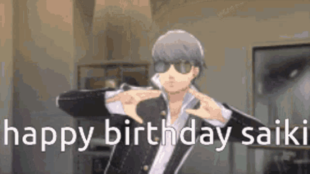 a man wearing sunglasses is making a heart shape with his hands and the words `` happy birthday saiki '' behind him .