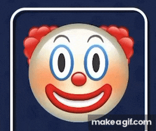 a clown emoji with blue eyes and red clown hair