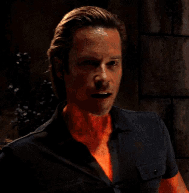 a man with flames coming out of his mouth and neck