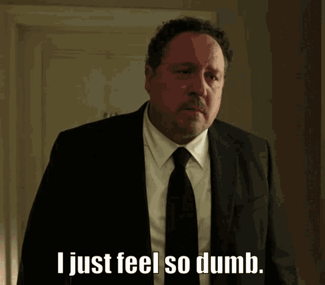 a man in a suit and tie says that he just feels so dumb