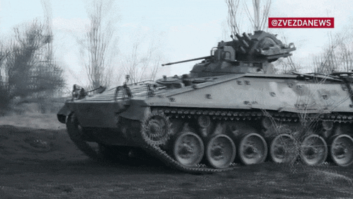 a black and white photo of a military vehicle with the words @zvezdanews in the upper right corner