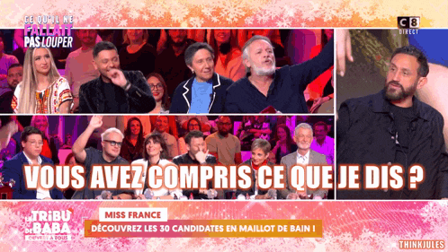 a group of people sitting in front of a screen that says miss france on it