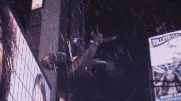 an aerial view of an explosion with a marvel logo in the lower right corner