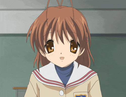 a girl with brown hair is wearing a school uniform with a badge on her pocket