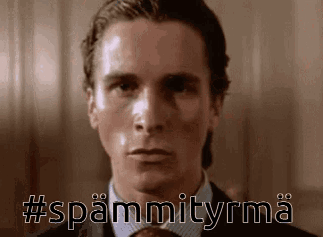 a close up of a man 's face with the words #spammityrma written below him