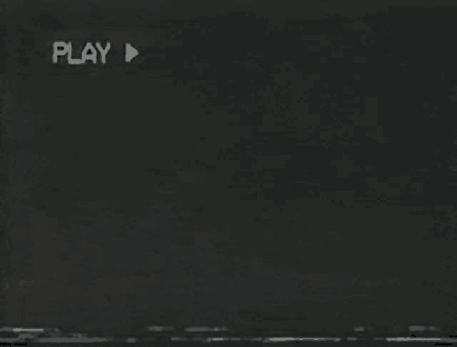 a black screen with the word play written on it