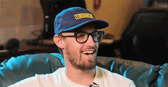 a man wearing glasses and a gorilla hat