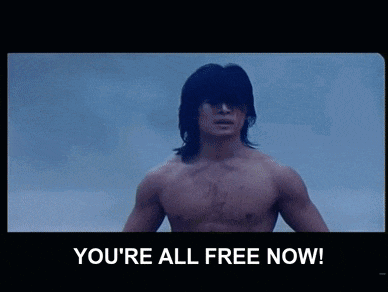 a man without a shirt is standing in front of a cloudy sky with the words you 're all free now .