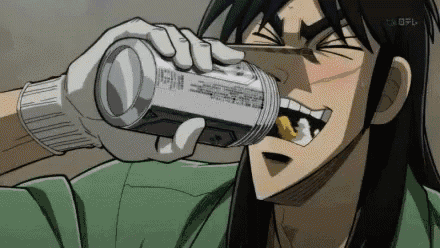 a man in a green shirt is drinking from a can