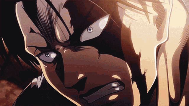 a close up of a man 's face with a very angry look on his face