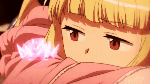a close up of a girl with blonde hair and red eyes holding a pink flower .
