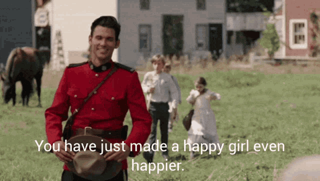 a man in a red uniform with the words " you have just made a happy girl even happier " written below him