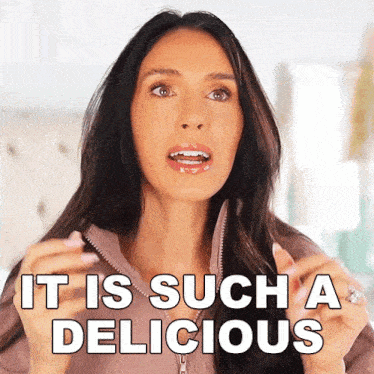 a woman says it is such a delicious with her hands