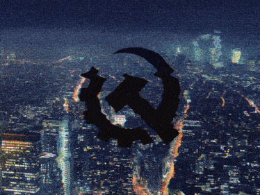 a hammer and sickle are silhouetted against a city skyline at night
